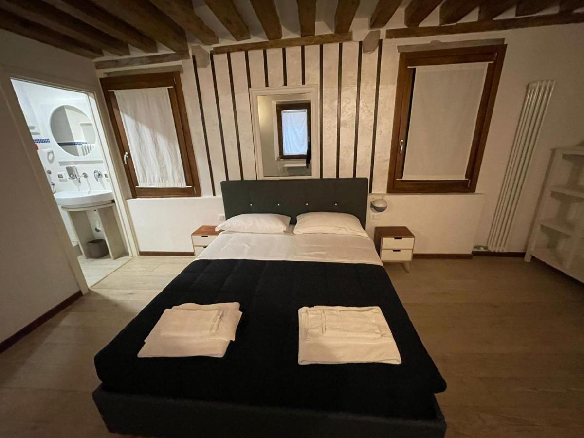 Quarto Triplo com Casa de Banho Privativa