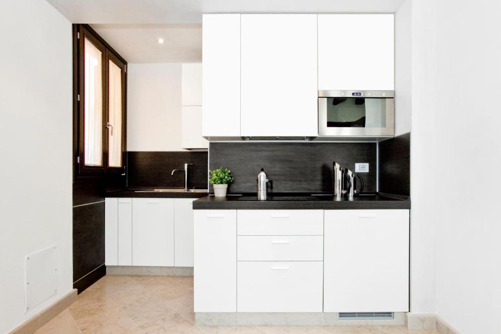 Quarto Duplo com Kitchenette