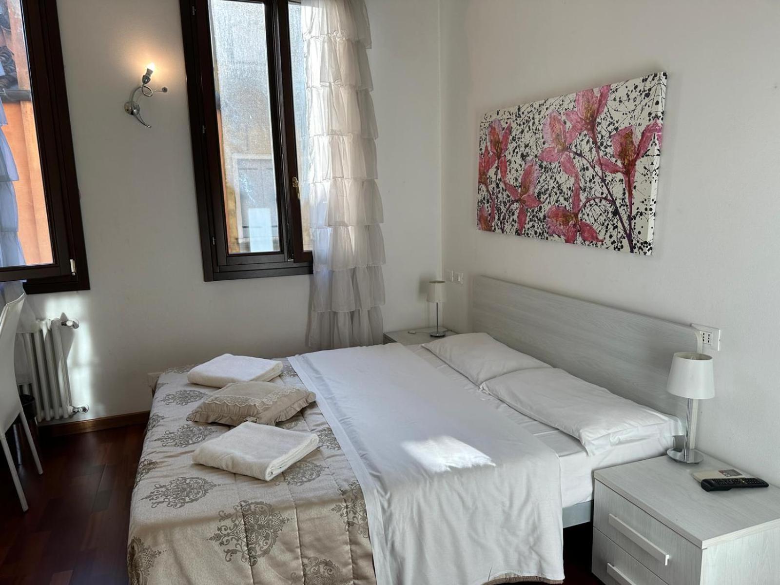 Quarto Duplo
