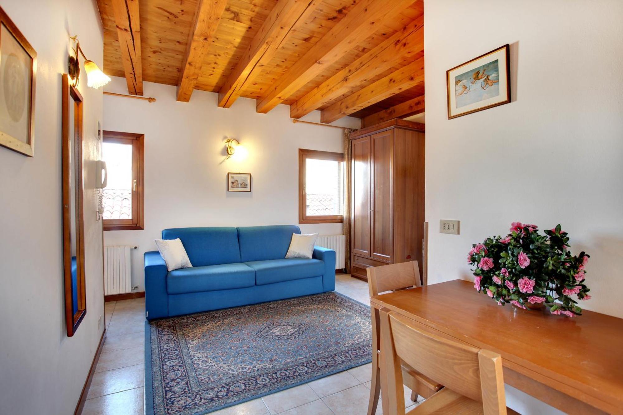 Quarto Quádruplo com Terraço e Vista Canal